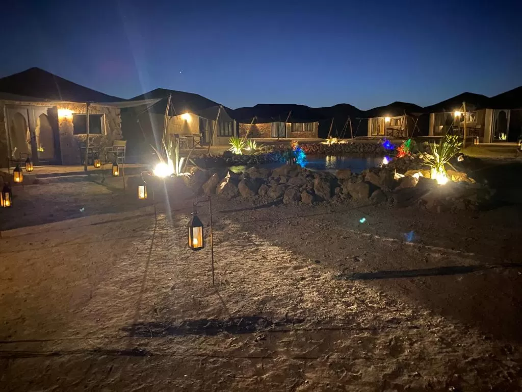 A mesmerizing view of the Agafay Desert Night Pass with stars illuminating the sky.